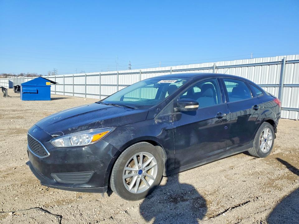 FORD FOCUS 2015 with VIN 1FADP3F26FL329354 - Photo from auction