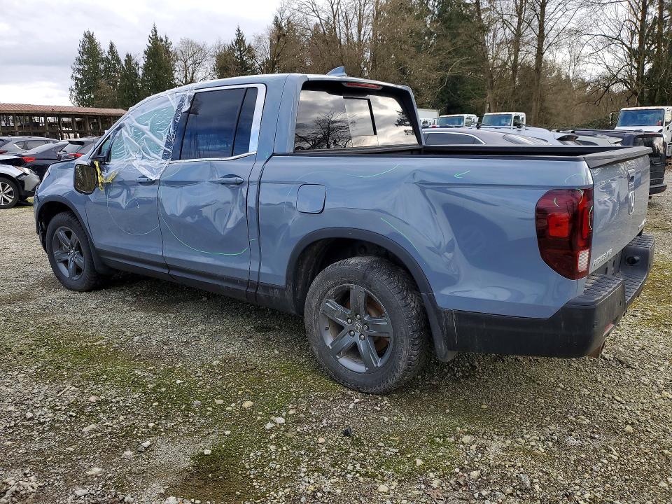 Photo 2 from auction – 2022 HONDA RIDGELINE with VIN 5FPYK3F73NB503010