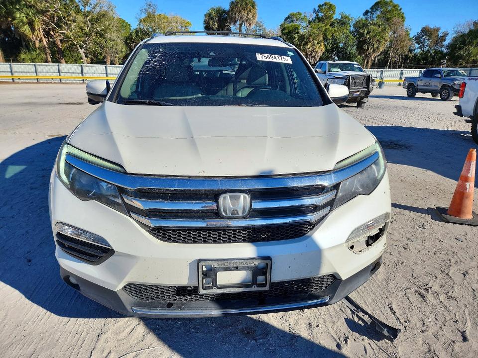 Photo 5 from auction – 2016 HONDA PILOT with VIN 5FNYF6H99GB100780