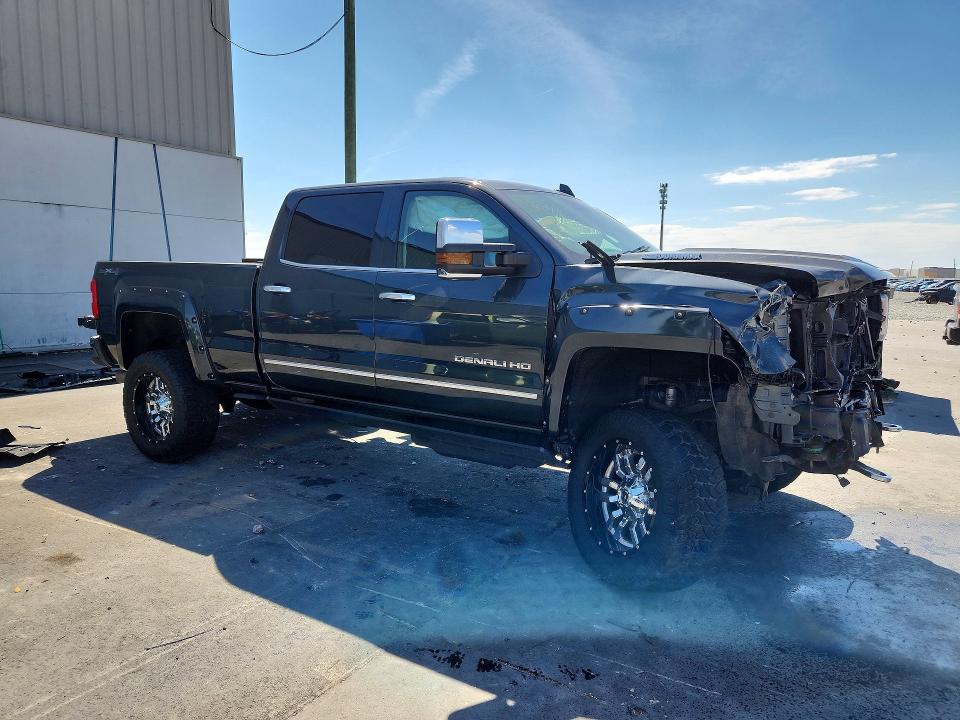Photo 4 from auction – 2018 GMC SIERRA with VIN 1GT12UEY2JF109434