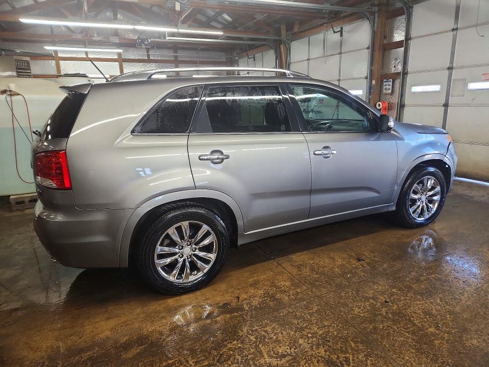 Photo 3 from auction – 2013 KIA SORENTO SX with VIN 5XYKW4A26DG381738