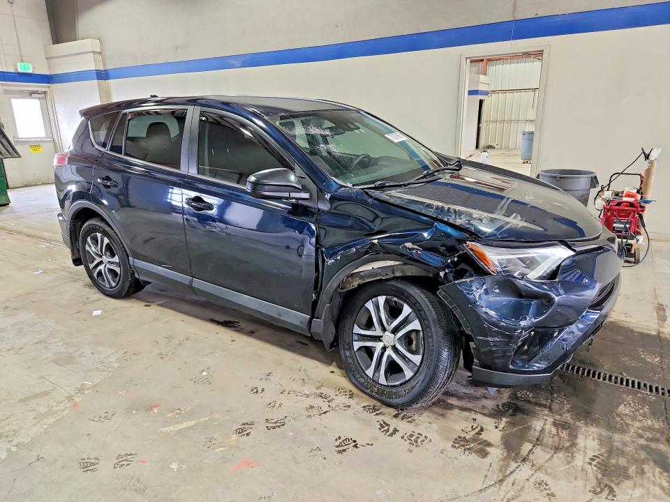 Photo 4 from auction – 2018 TOYOTA RAV4 with VIN 2T3ZFREVXJW474775
