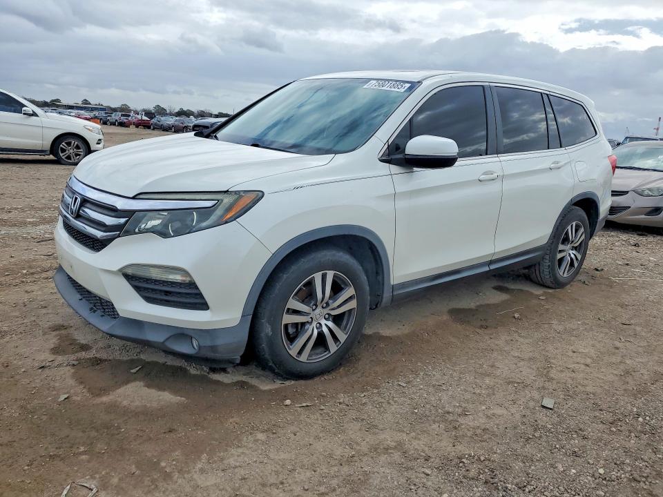 HONDA PILOT 2017 with VIN 5FNYF5H77HB013874 - Photo from auction