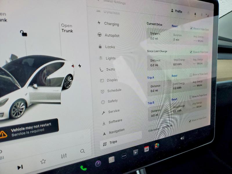 Photo 9 from auction – 2018 TESLA MODEL 3 with VIN 5YJ3E1EB8JF117617