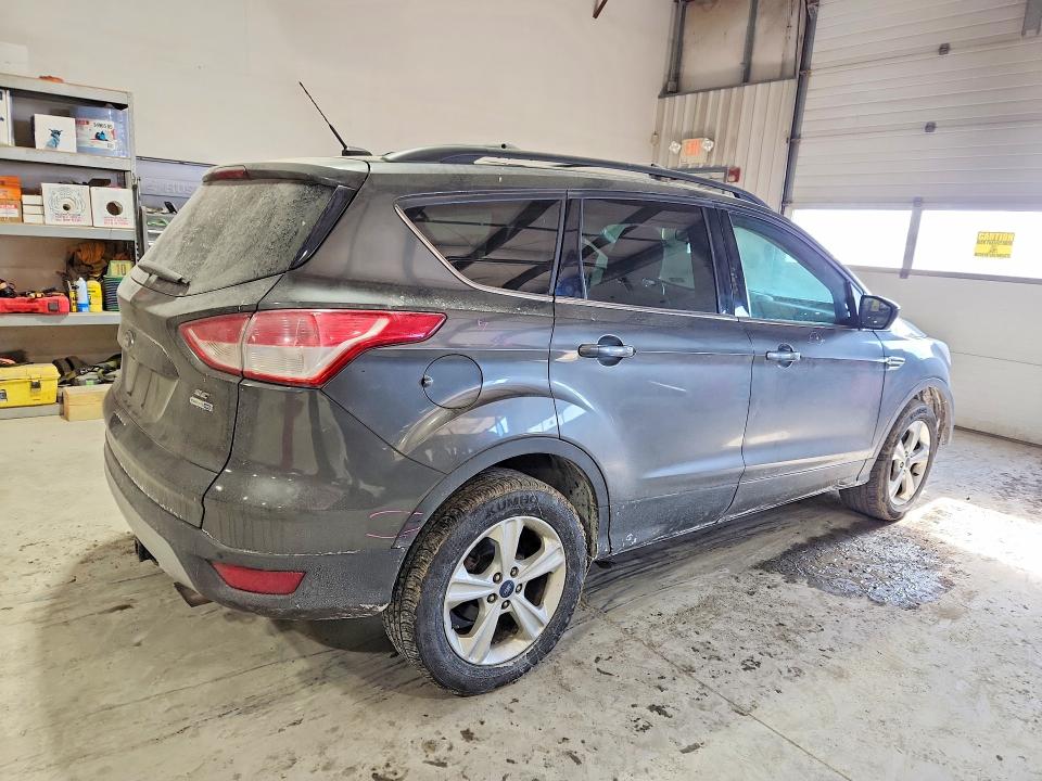 Photo 3 from auction – 2015 FORD ESCAPE with VIN 1FMCU9G90FUA66362