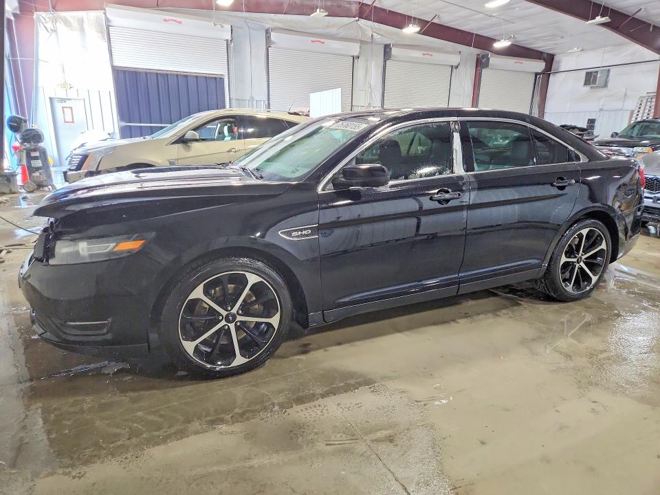 FORD TAURUS 2016 with VIN 1FAHP2KT2GG157702 - Photo from auction