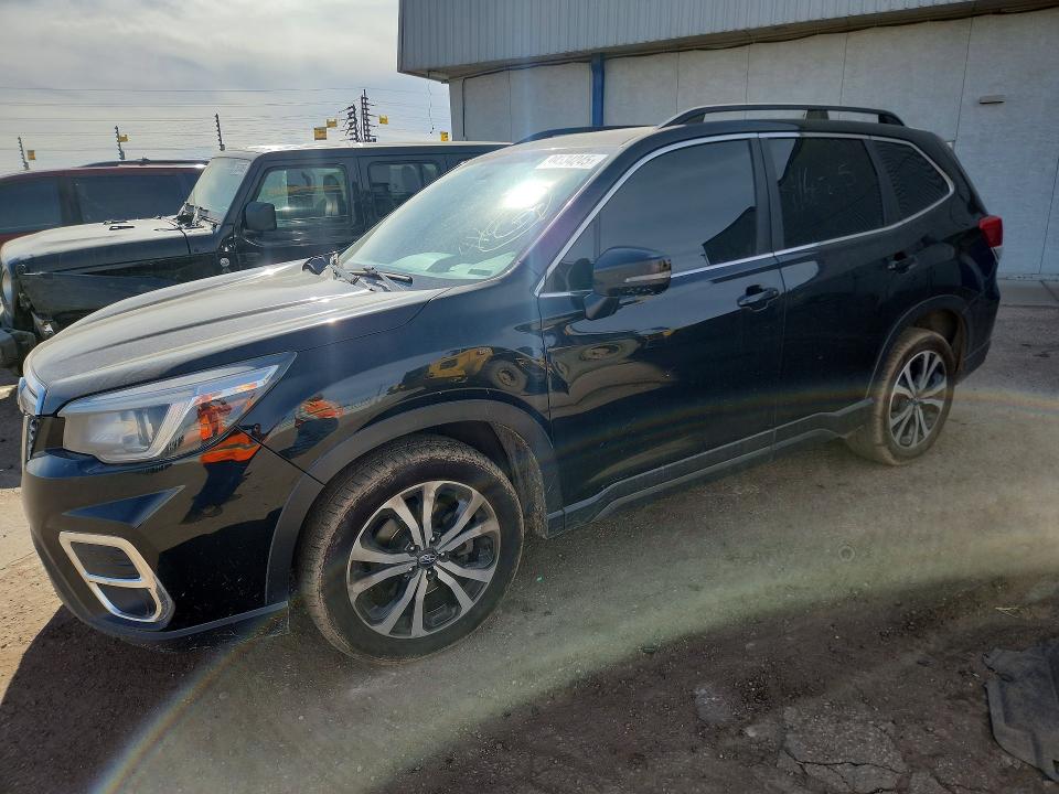 SUBARU FORESTER 2019 with VIN JF2SKAUC9KH450796 - Photo from auction