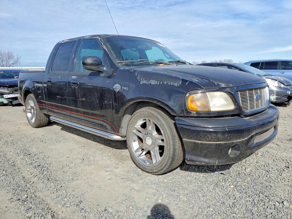 Photo 4 from auction – 2001 FORD F150 with VIN 1FTRW07L01KA92058