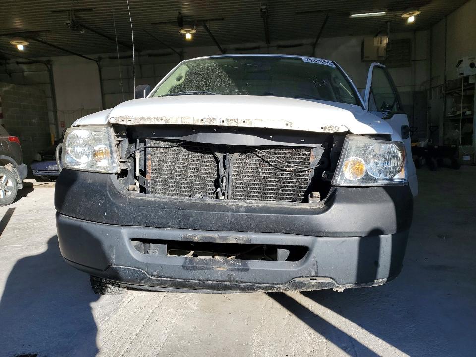 Photo 5 from auction – 2006 FORD F150 with VIN 1FTRF12256NB27946