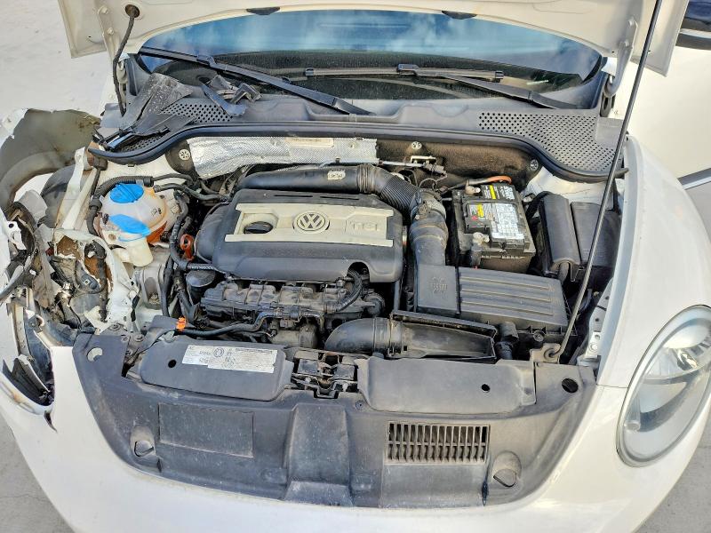 Photo 11 from auction – 2012 VOLKSWAGEN BEETLE TUR with VIN 3VWVA7AT6CM621648