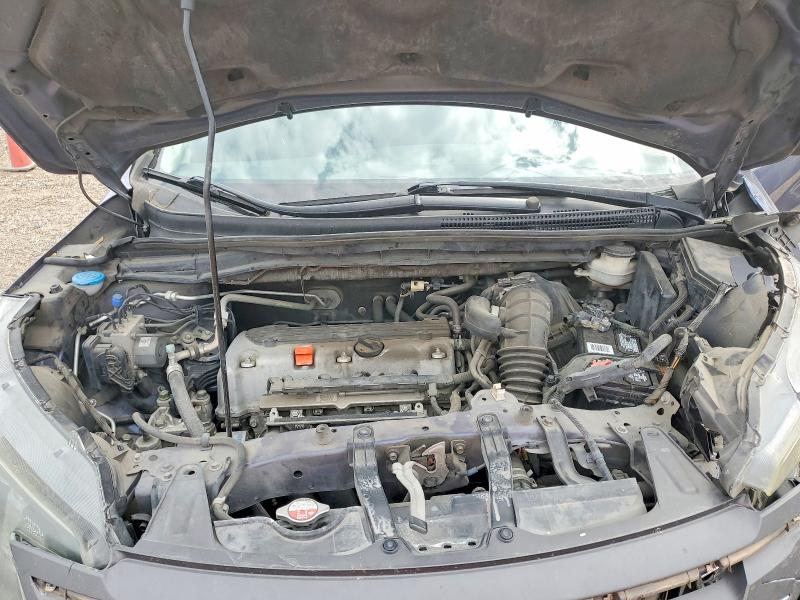 Photo 11 from auction – 2014 HONDA CR-V with VIN 3CZRM3H39EG700642
