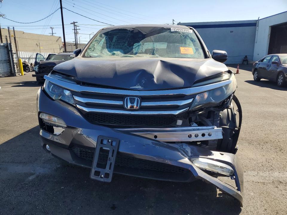 Photo 5 from auction – 2016 HONDA PILOT with VIN 5FNYF5H67GB036738