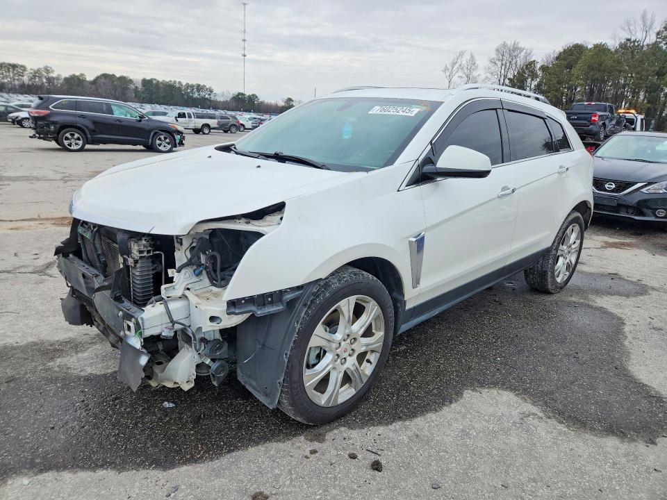 CADILLAC SRX PERFOR 2014 with VIN 3GYFNCE36ES616215 - Photo from auction
