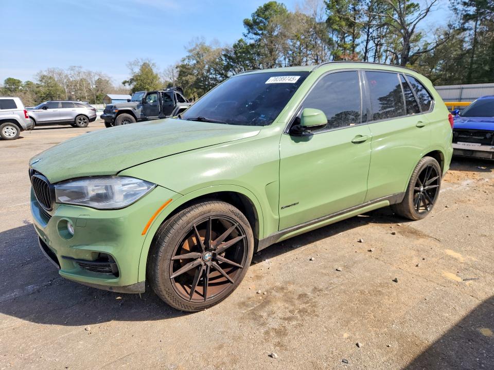 BMW X5 2014 с VIN 5UXKR2C59E0H31603 - Фото с аукциона
