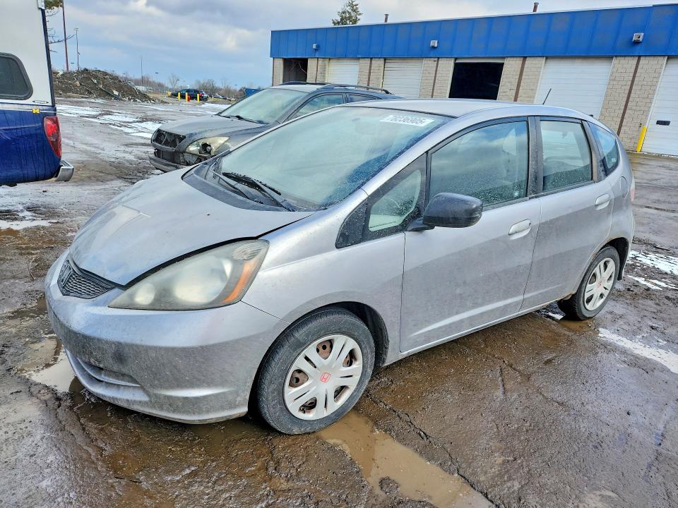 HONDA FIT 2009 with VIN JHMGE87299S040793 - Photo from auction