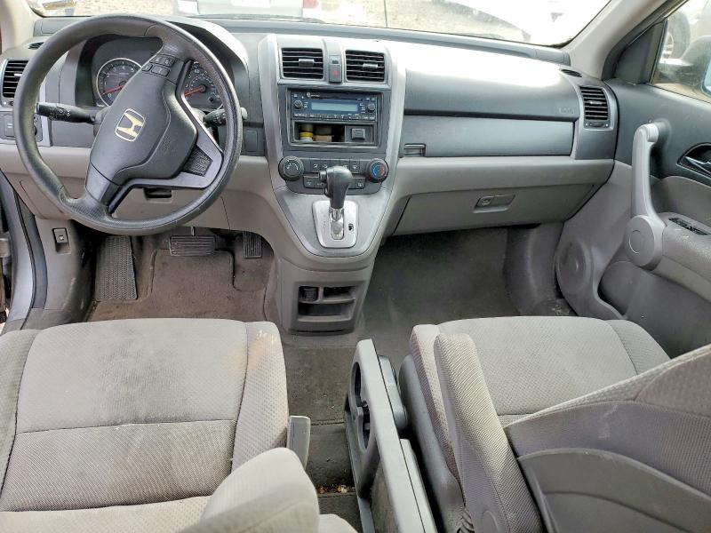 Photo 8 from auction – 2007 HONDA CR-V LX with VIN JHLRE383X7C011365