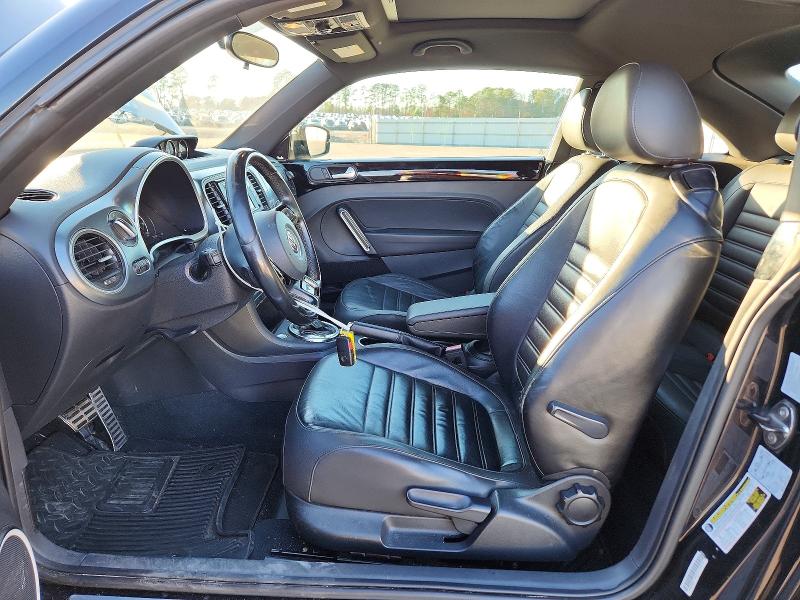 Photo 7 from auction – 2014 VOLKSWAGEN BEETLE TUR with VIN 3VWVS7AT1EM630578