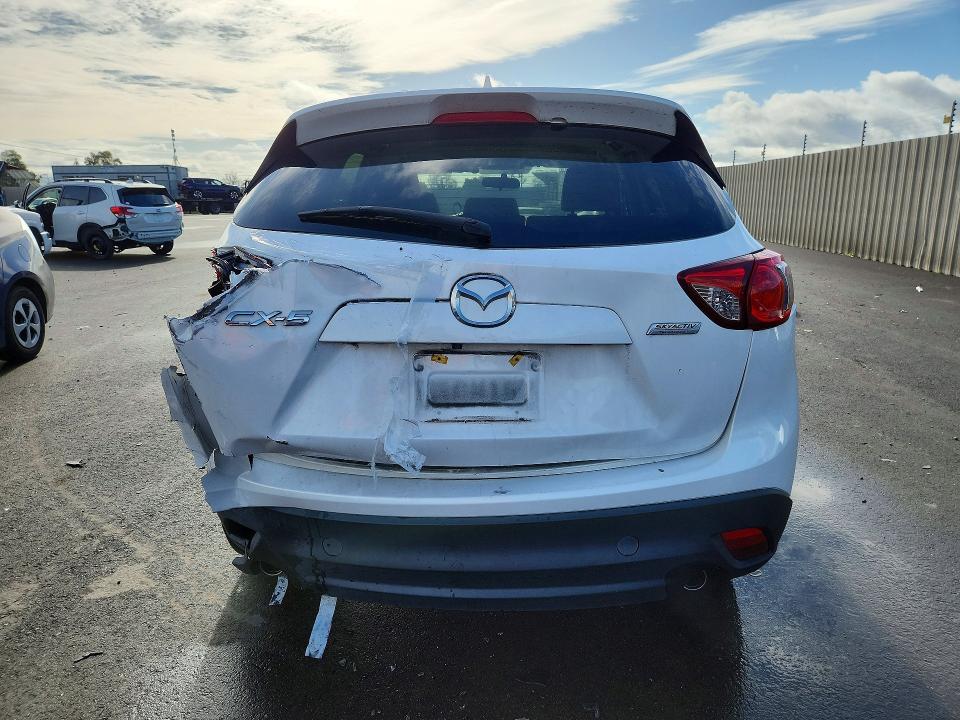 Photo 6 from auction – 2016 MAZDA CX-5 with VIN JM3KE2CY5G0763060