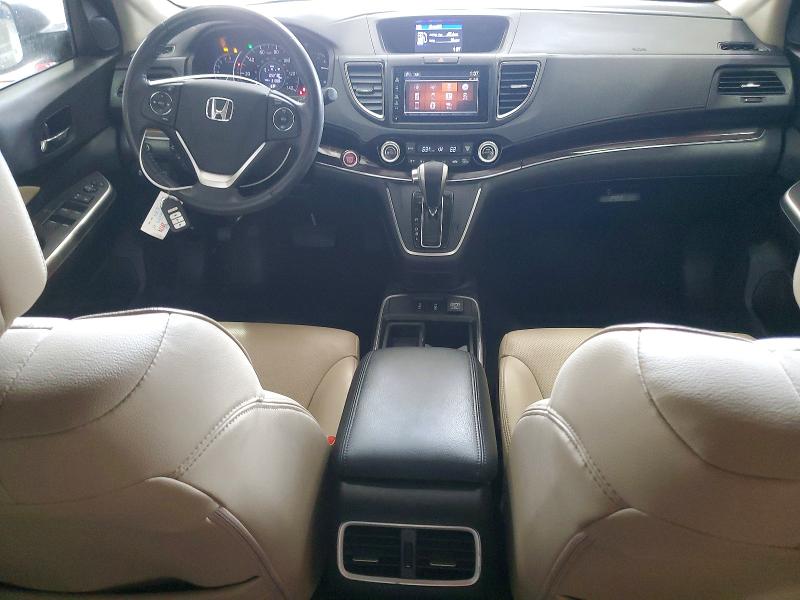 Photo 8 from auction – 2015 HONDA CR-V with VIN 2HKRM3H73FH550206