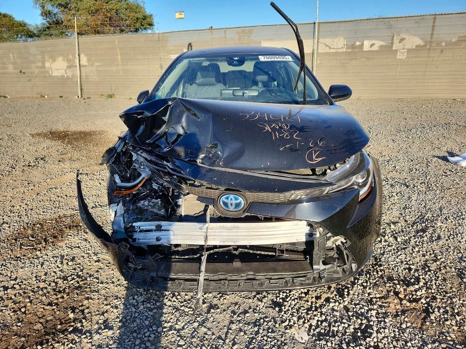 Photo 5 from auction – 2022 TOYOTA COROLLA with VIN JTDEAMDE6NJ057112