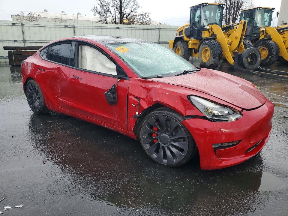 Photo 4 from auction – 2021 TESLA MODEL 3 with VIN 5YJ3E1EC8MF875051