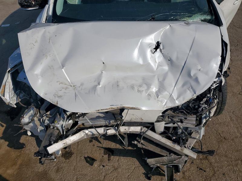 Photo 11 from auction – 2021 TOYOTA PRIUS with VIN JTDKAMFU2M3127232