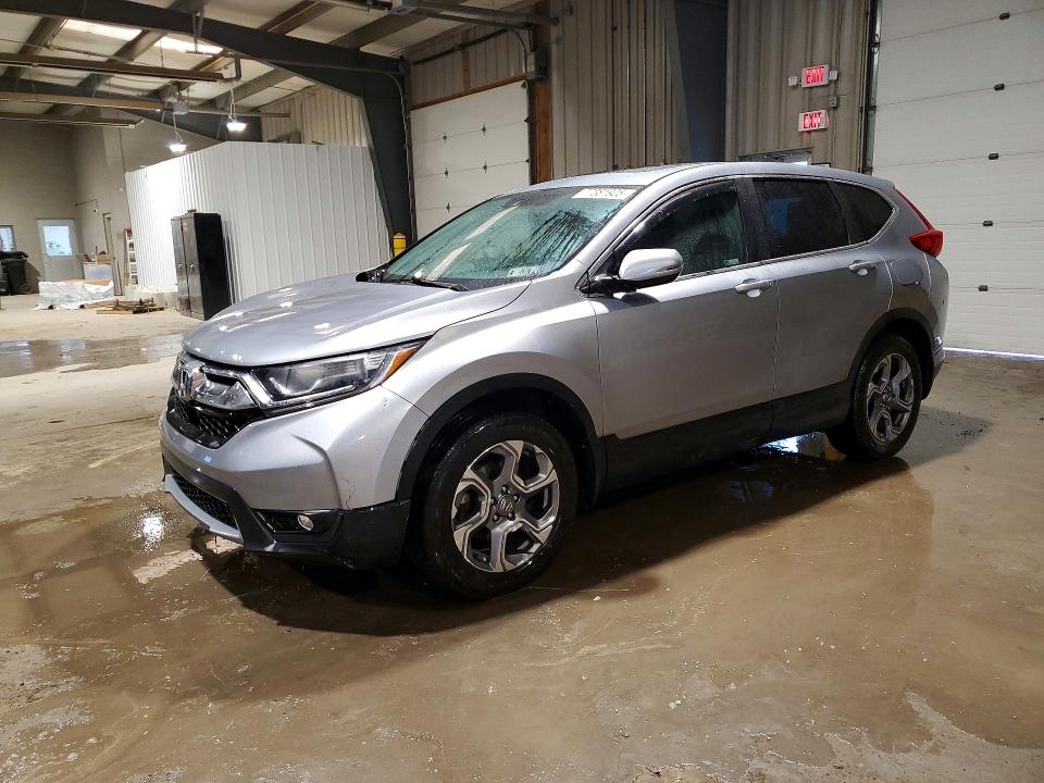 Photo 1 from auction – 2018 HONDA CR-V with VIN 2HKRW2H80JH693099