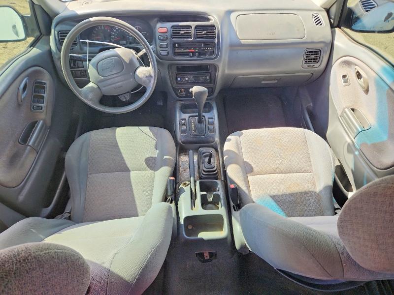 Photo 8 from auction – 1999 CHEVROLET TRACKER with VIN 2CNBJ13C2X6921196