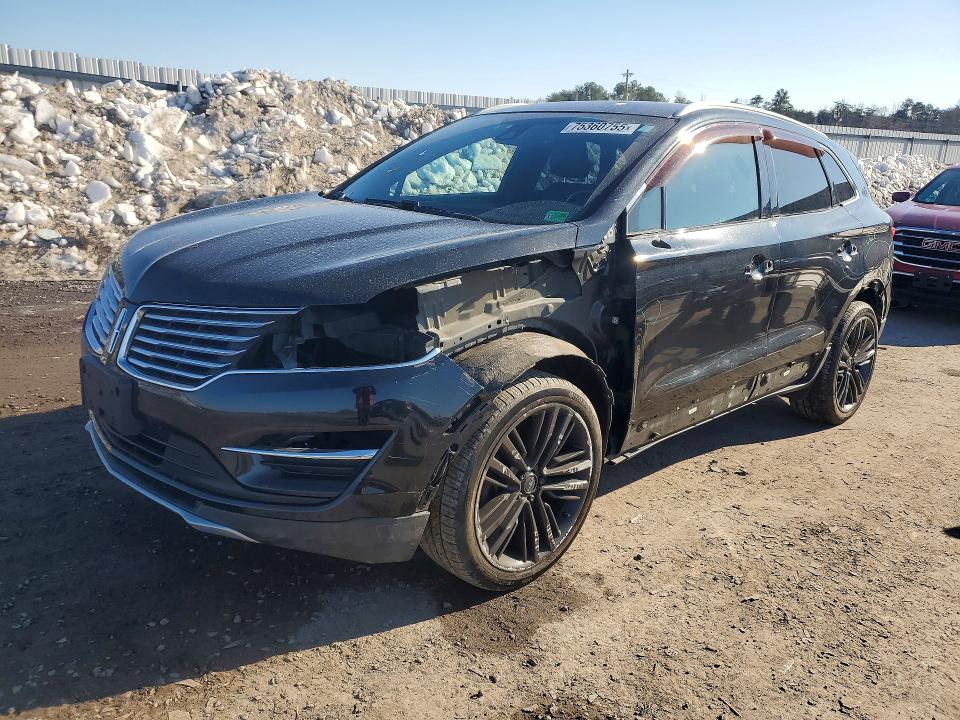 LINCOLN MKC 2015 with VIN 5LMTJ2AH1FUJ36772 - Photo from auction