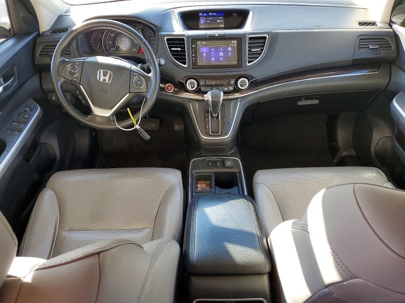 Photo 8 from auction – 2015 HONDA CR-V with VIN 2HKRM3H72FH522610