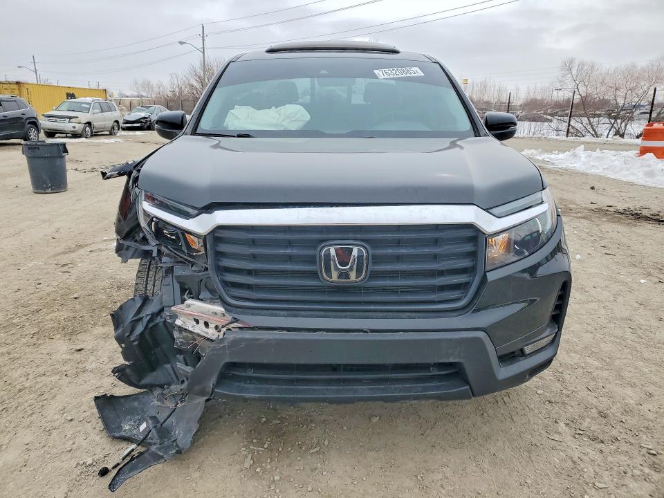 Photo 5 from auction – 2023 HONDA RIDGELINE with VIN 5FPYK3F51PB042309