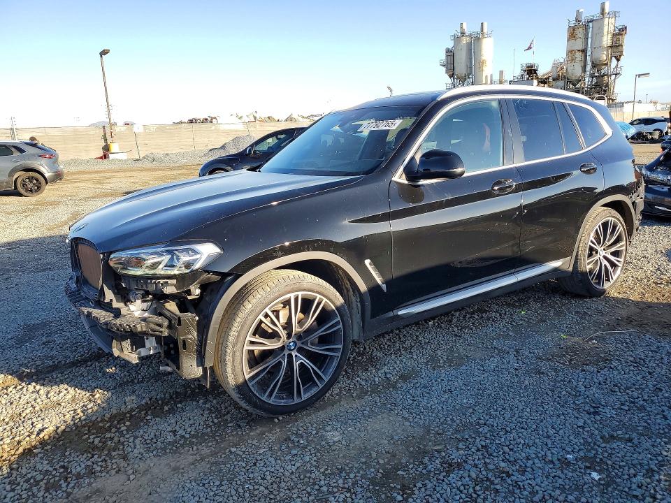 BMW X3 2022 with VIN 5UX43DP09N9K84736 - Photo from auction
