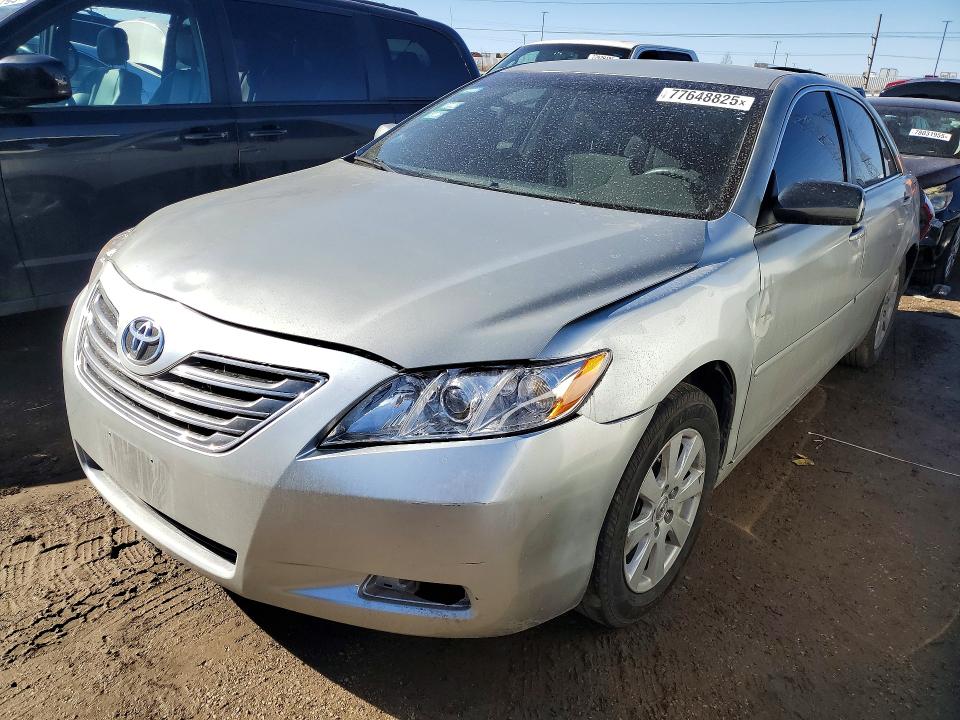 TOYOTA CAMRY HYBR 2007 with VIN JTNBB46K473023028 - Photo from auction