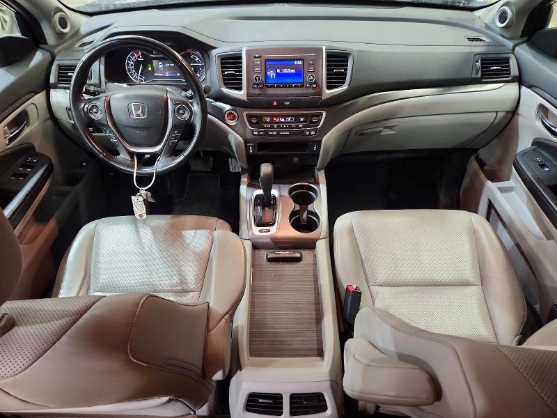 Photo 8 from auction – 2017 HONDA RIDGELINE with VIN 5FPYK3F56HB005290