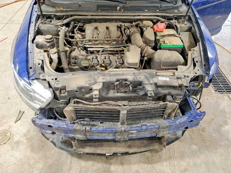Photo 11 from auction – 2015 FORD TAURUS with VIN 1FAHP2D8XFG194388