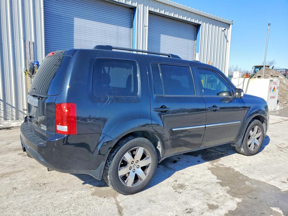 Photo 3 from auction – 2014 HONDA PILOT TOUR with VIN 5FNYF4H99EB053509