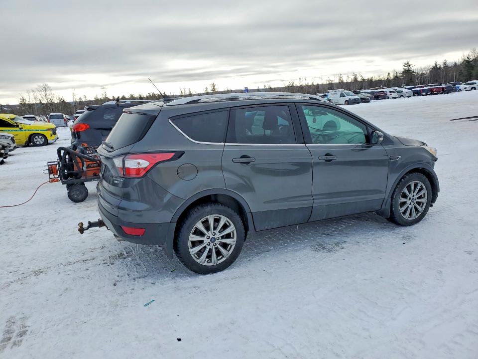 Photo 3 from auction – 2018 FORD ESCAPE TIT with VIN 1FMCU9J96JUB88094