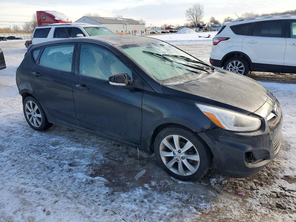 Photo 4 from auction – 2014 HYUNDAI ACCENT GLS with VIN KMHCU5AE0EU168550