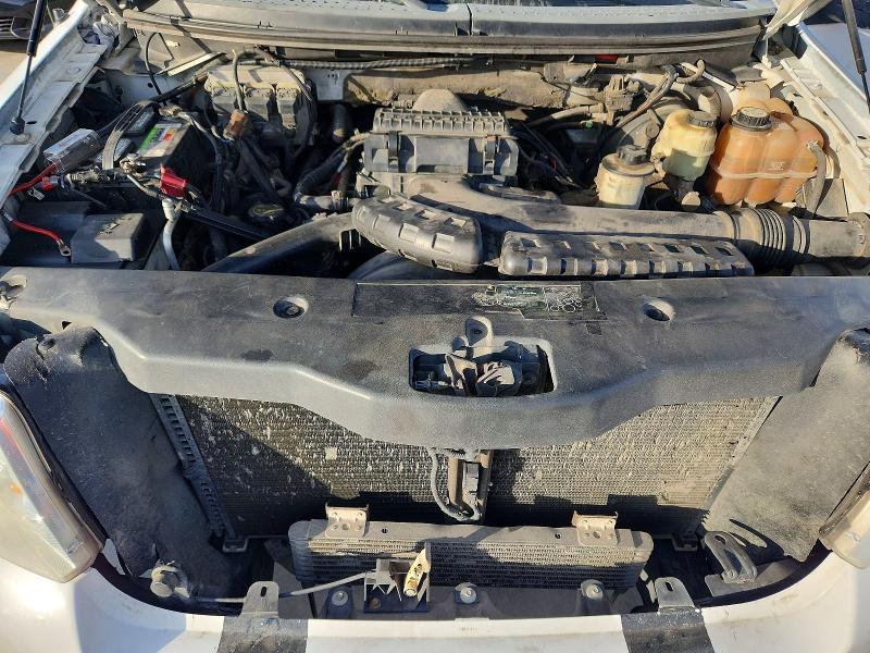 Photo 11 from auction – 2004 FORD F150 with VIN 1FTPW12564KA67370