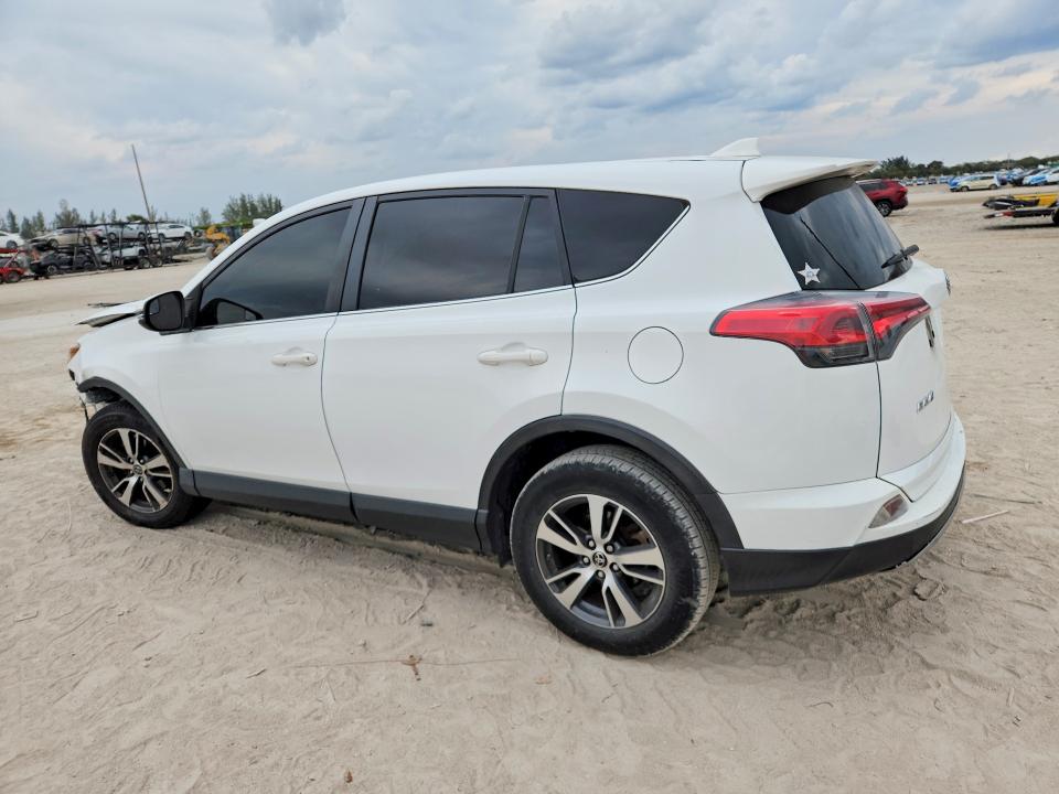 Photo 2 from auction – 2018 TOYOTA RAV4 with VIN JTMWFREV5JJ204192