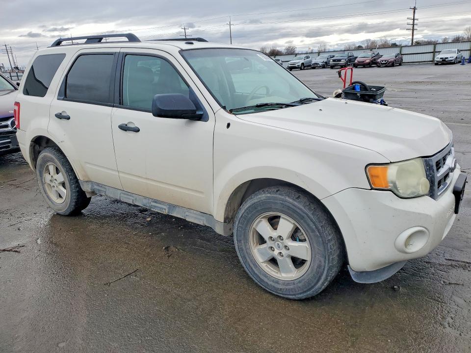 Photo 4 from auction – 2011 FORD ESCAPE with VIN 1FMCU9DG9BKB35347