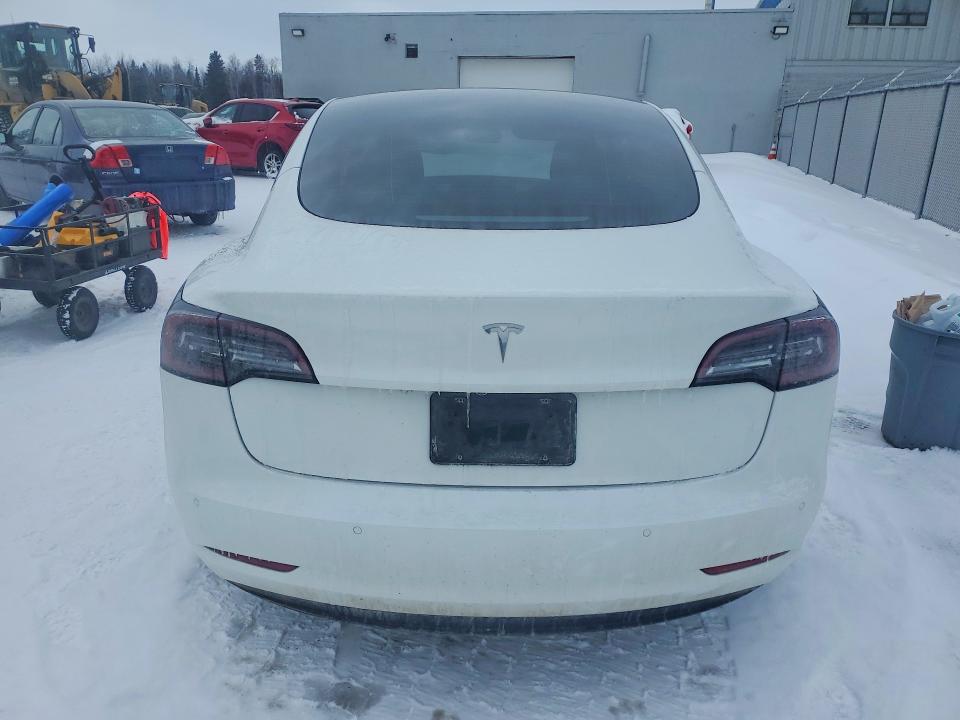 Photo 6 from auction – 2021 TESLA MODEL 3 with VIN 5YJ3E1EA3MF982295
