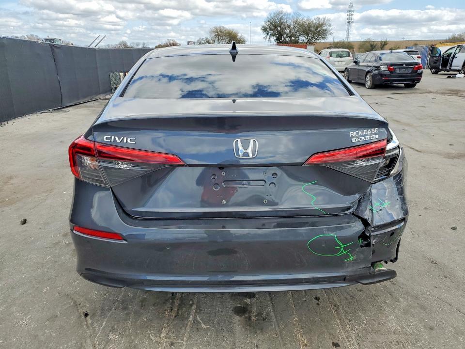 Photo 6 from auction – 2022 HONDA CIVIC with VIN 2HGFE1F95NH304274