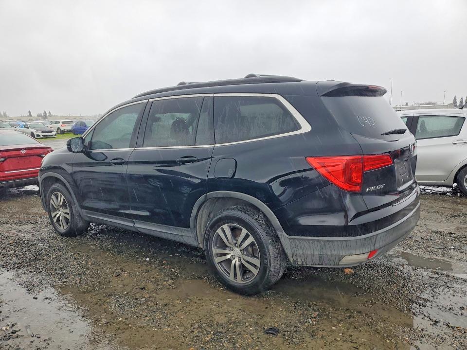 Photo 2 from auction – 2016 HONDA PILOT with VIN 5FNYF5H53GB003758