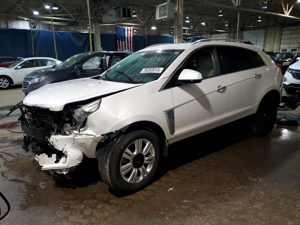CADILLAC SRX 2014 with VIN 3GYFNEE33ES536513 - Photo from auction