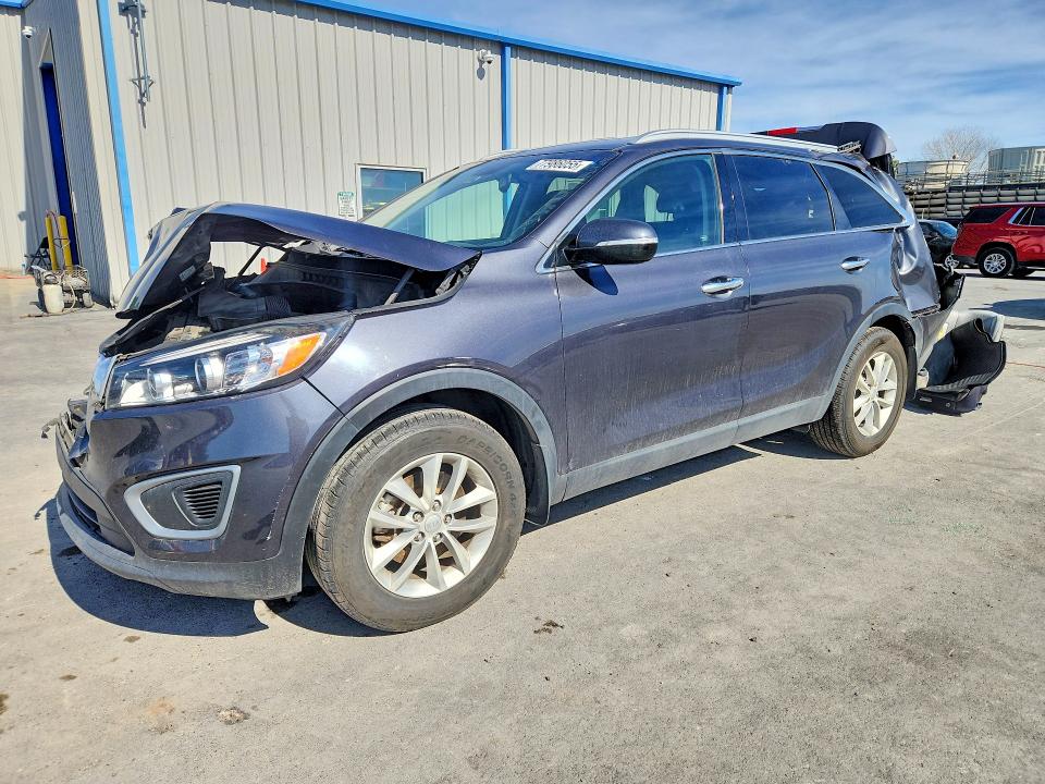 KIA SORENTO 2016 with VIN 5XYPG4A30GG056051 - Photo from auction