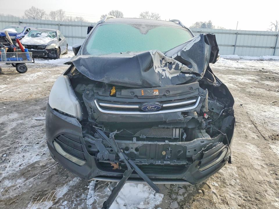 Photo 5 from auction – 2014 FORD ESCAPE with VIN 1FMCU0JX2EUA37592