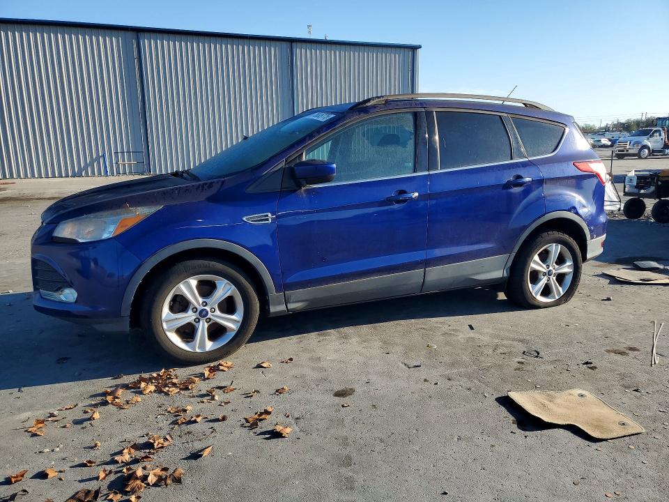 FORD ESCAPE SE 2015 with VIN 1FMCU0GXXFUA64709 - Photo from auction