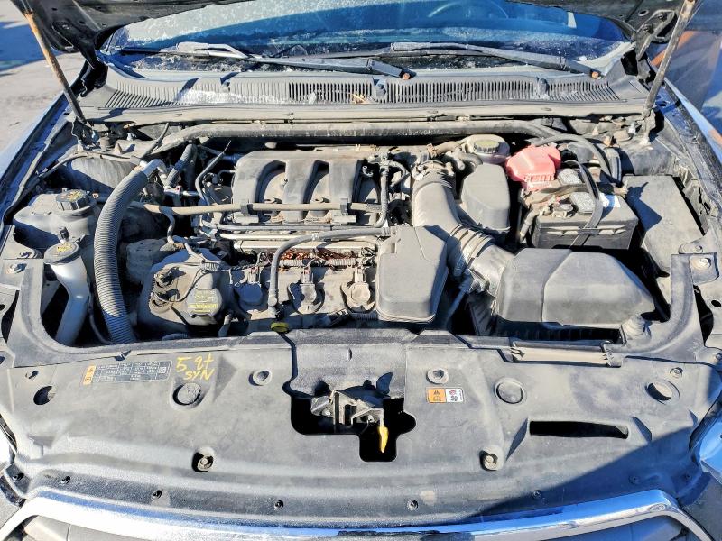 Photo 11 from auction – 2014 FORD TAURUS with VIN 1FAHP2E85EG112113