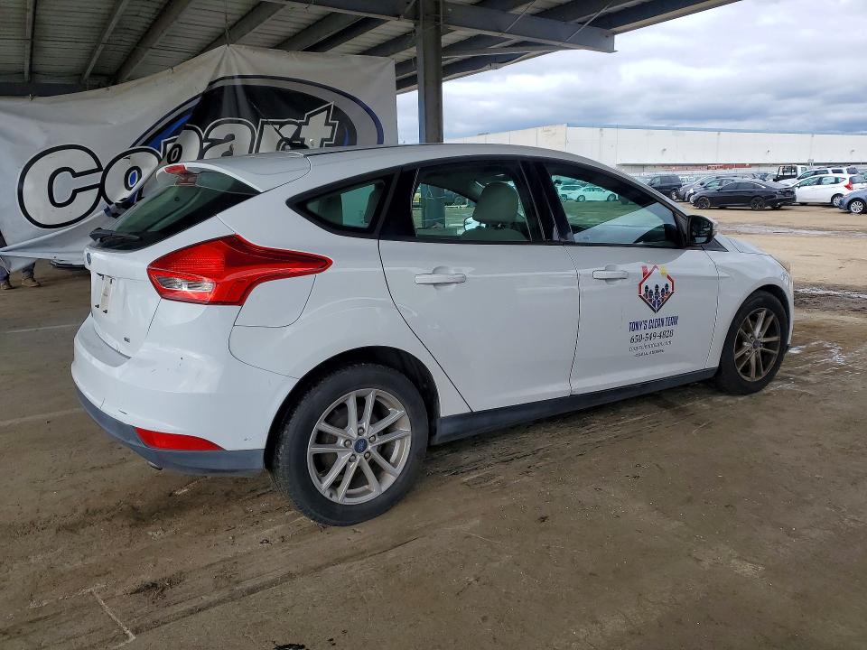 Photo 3 from auction – 2016 FORD FOCUS with VIN 1FADP3K2XGL286564